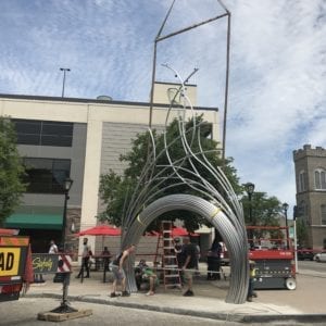 Installation of the sculpture project Arch on Old Falls Street near completion.