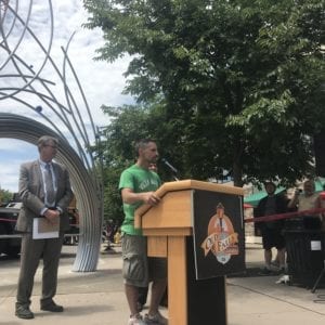 Associate professor of Interior Design Jesse Walp speaks at the shares his appreciation for public art being included in the revitalization of the downtown Niagara Falls area on July 13, 2018.