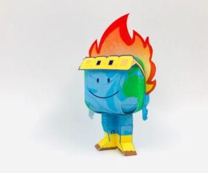 Assembled paper toy featuring the world with feet in yellow boots, 2020 glasses and its head on fire. 