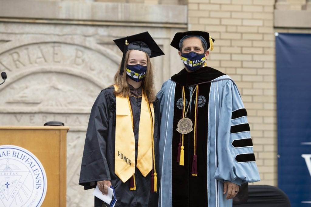 Jensen poses with Villa's president, Dr. Giordano